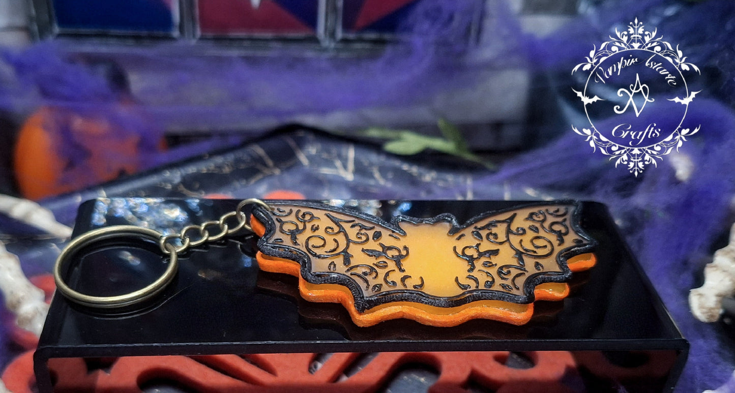 LLAVERO GOTHIC ORANGE BAT (brilla en la oscuridad)