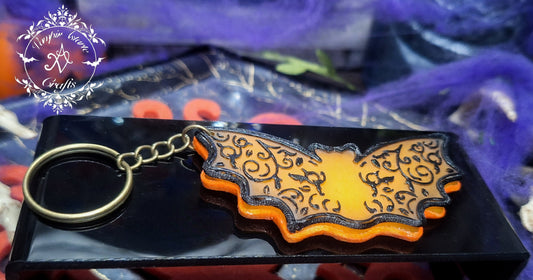 LLAVERO GOTHIC ORANGE BAT (brilla en la oscuridad)
